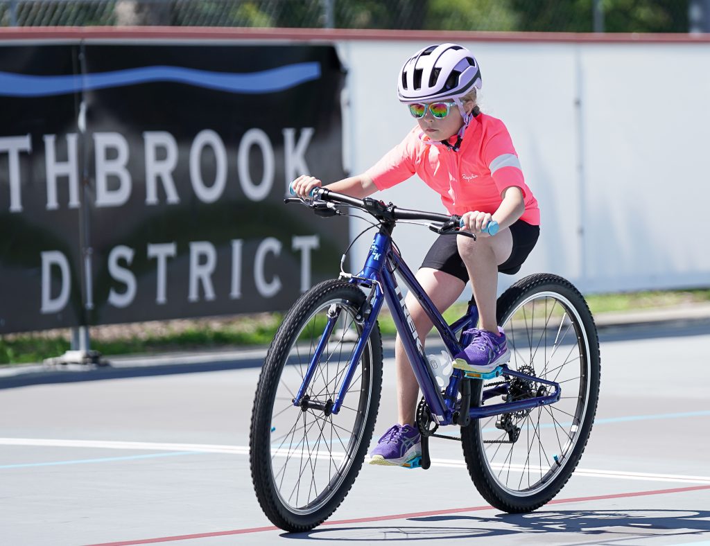 A bicycle rider practices on a road bike during warm ups at the Annual Velodrome 4k TT in Northbrook, IL